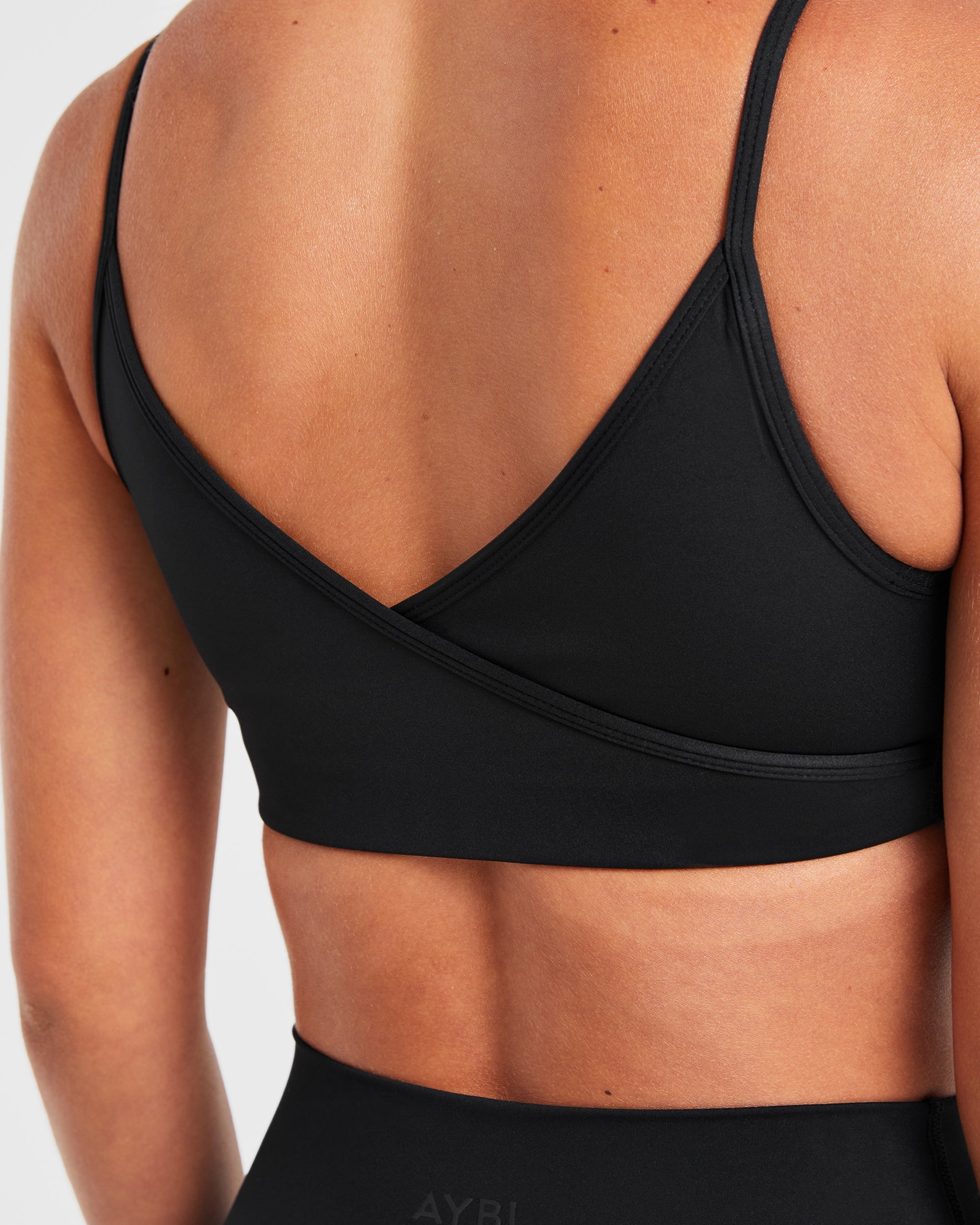Sculpt Wrap Sports Bra - Schwarz