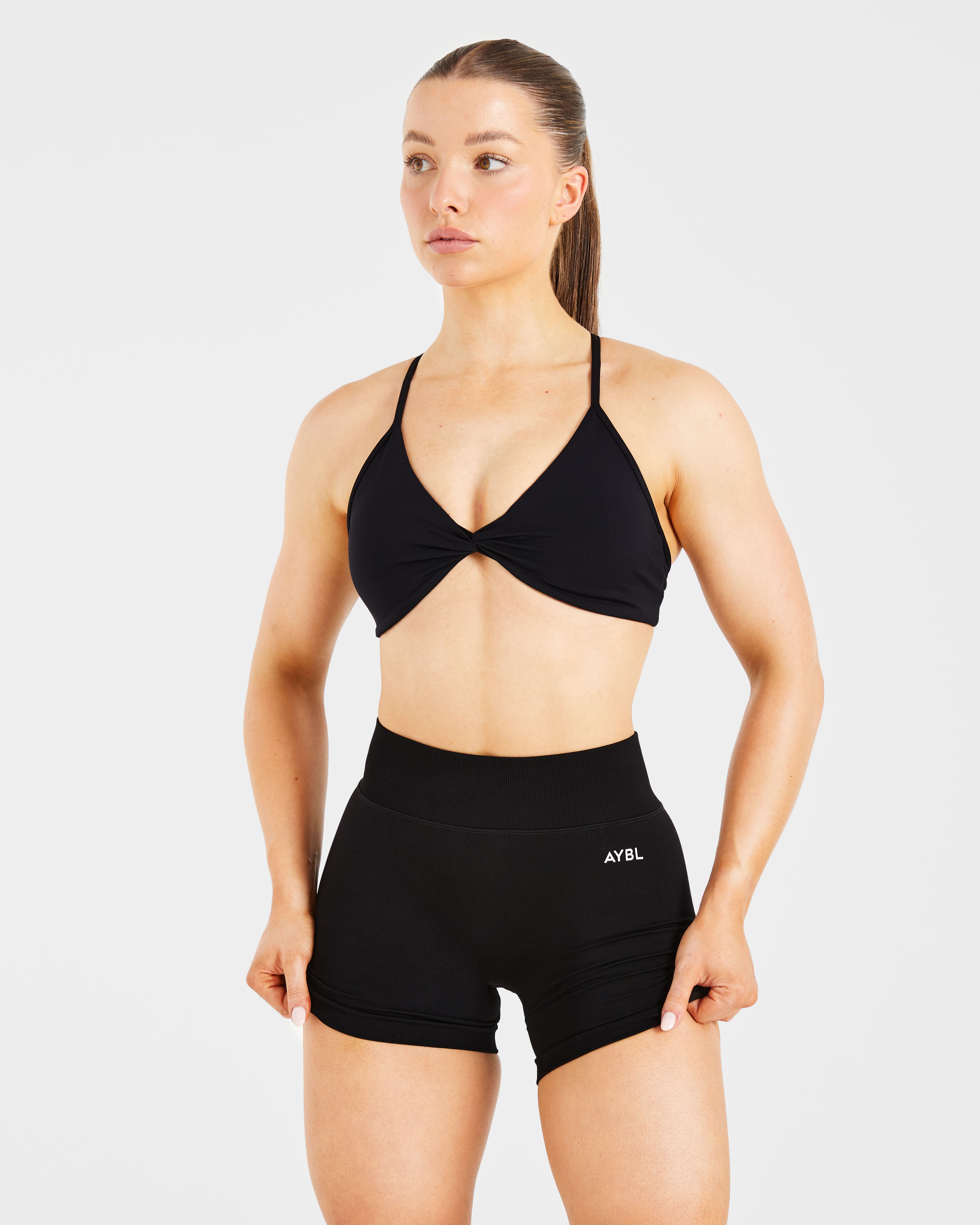Essential Twist Crossback Sports Bra - Schwarz