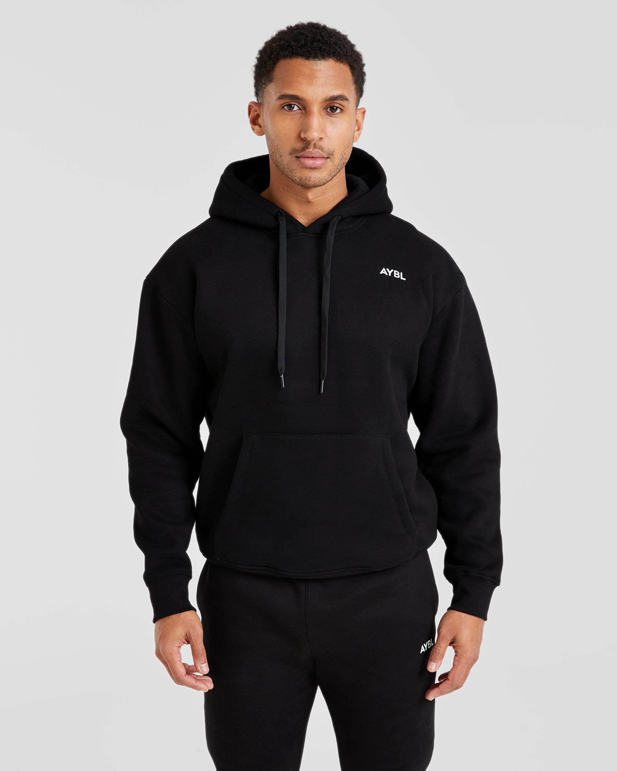 Pullover Hoodie Schwarzer Essentials Hoodie Hoodie In Loose Fit