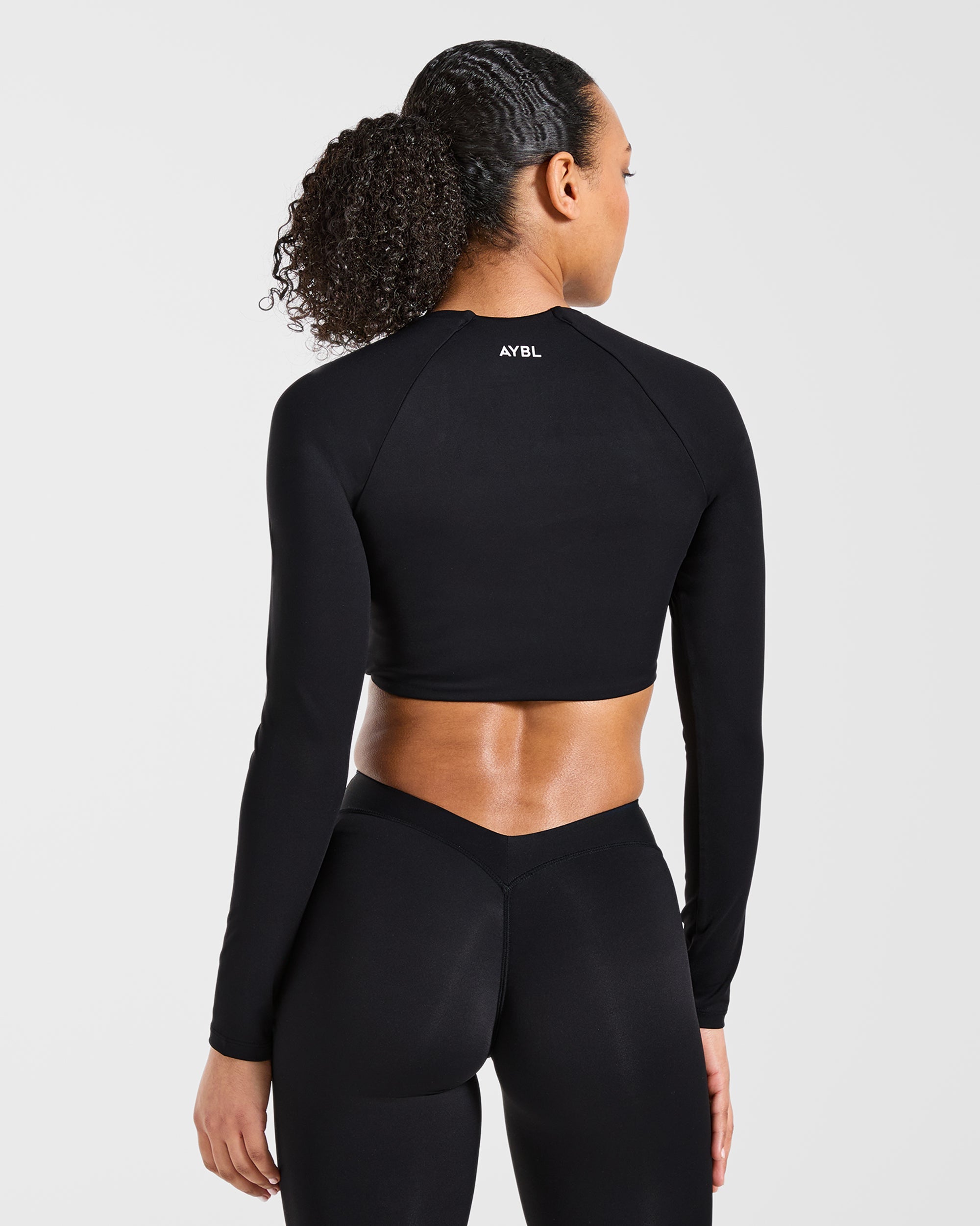 Physique Long Sleeve Crop Top - Schwarz