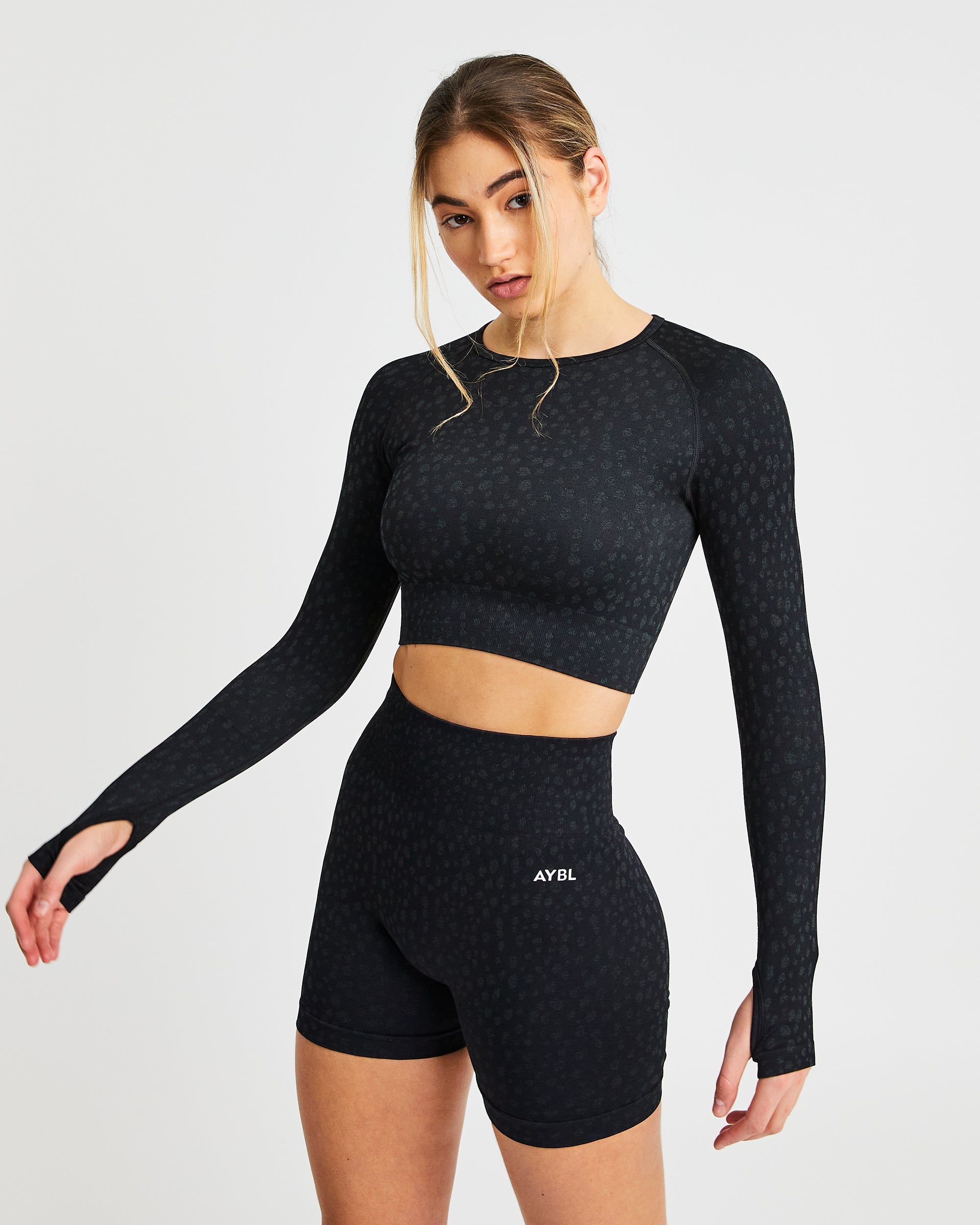 Evolve Speckle Seamless Long Sleeve Crop Top - Schwarz