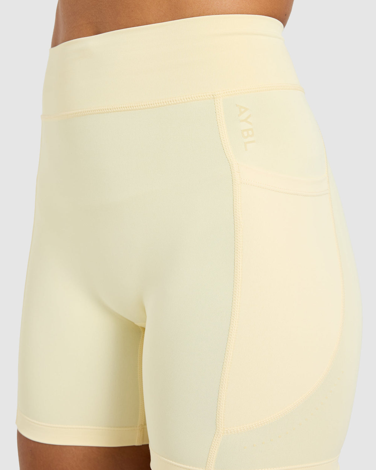 Run Pocket Shorts - Butter Gelb
