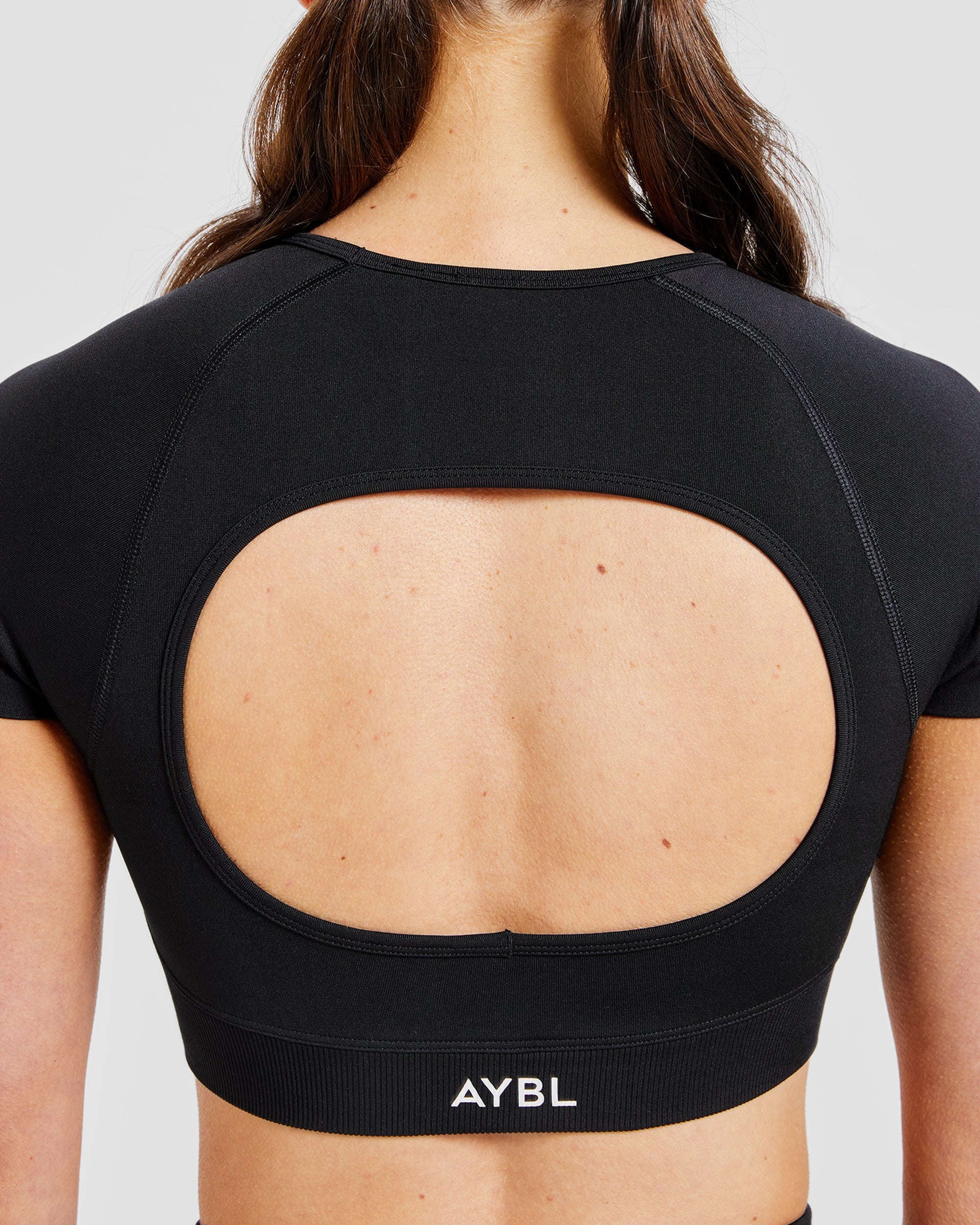 Adapt Seamless Crop Top - Schwarz