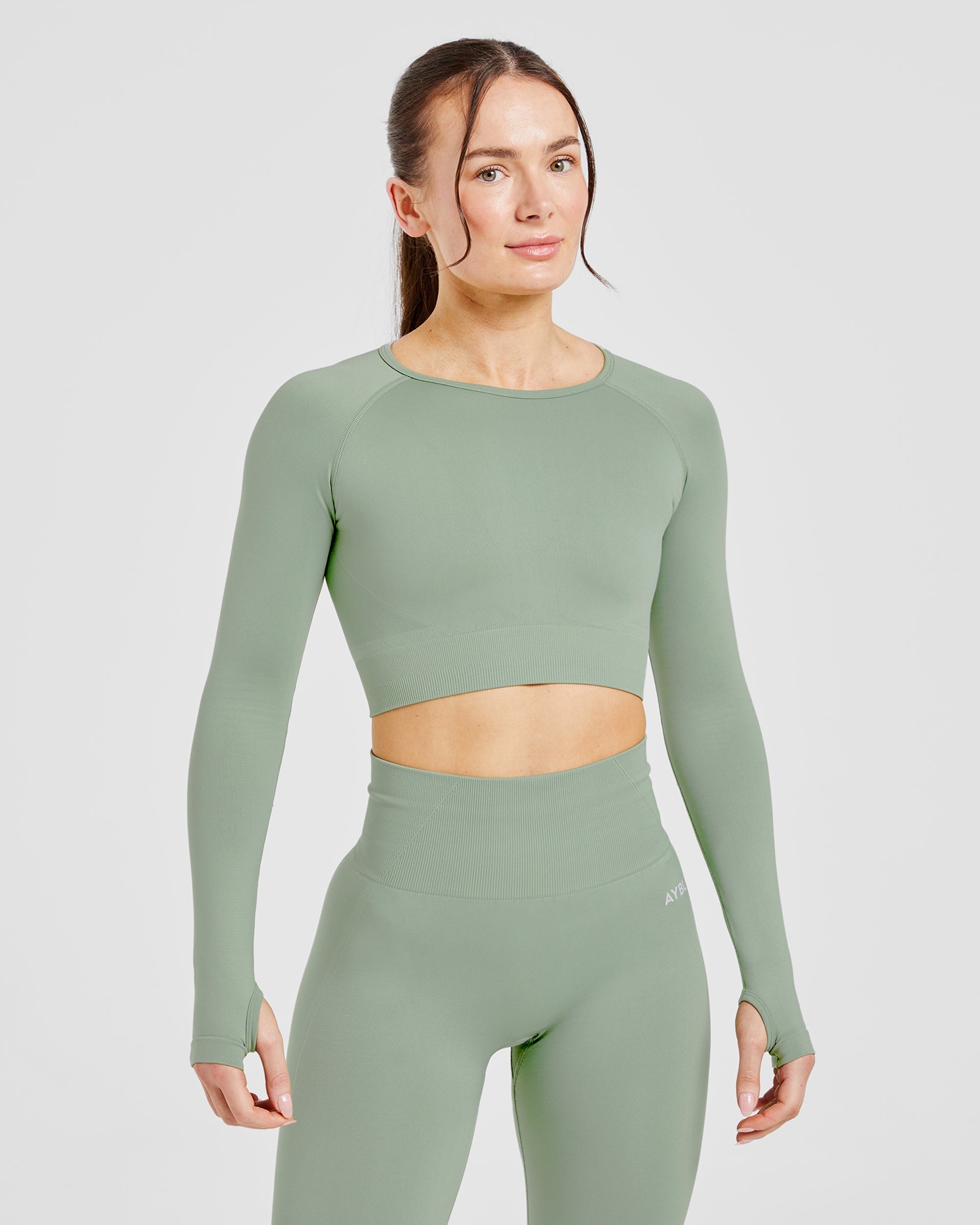 Empower Seamless Long Sleeve Crop Top - Grove Grün