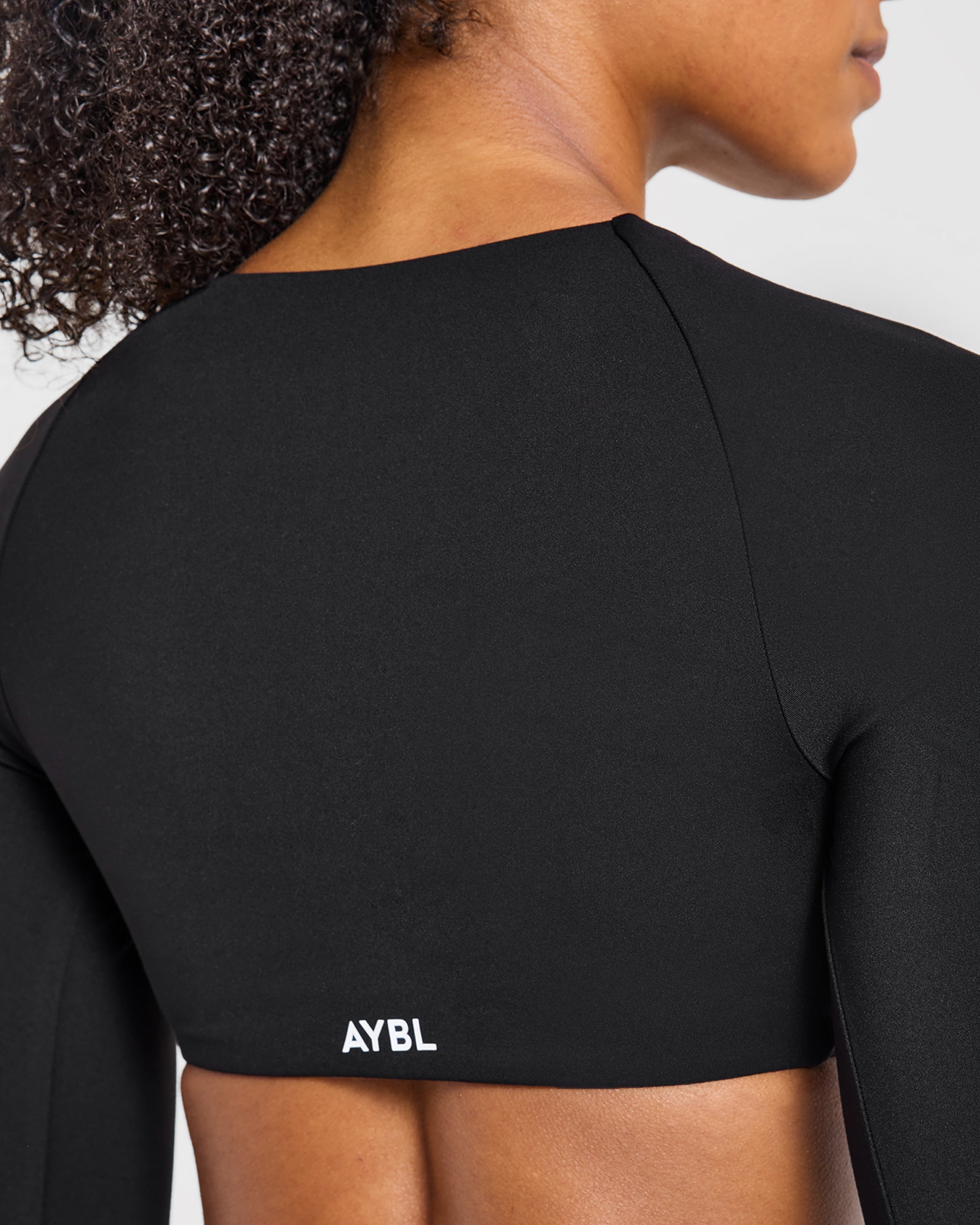 Engage Long Sleeve Crop Top - Schwarz