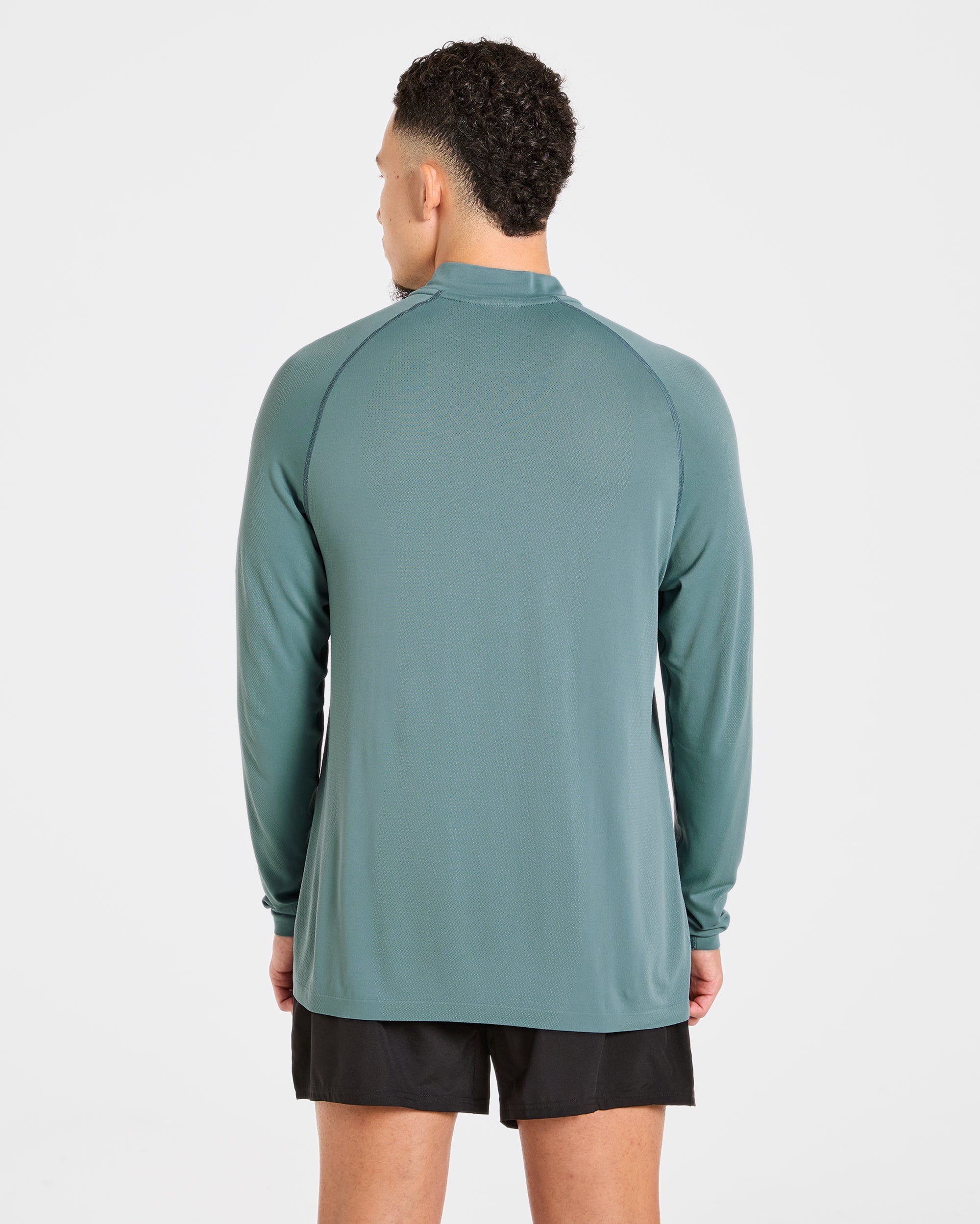Attain Seamless 1/2 Zip Pullover - Titan Blau
