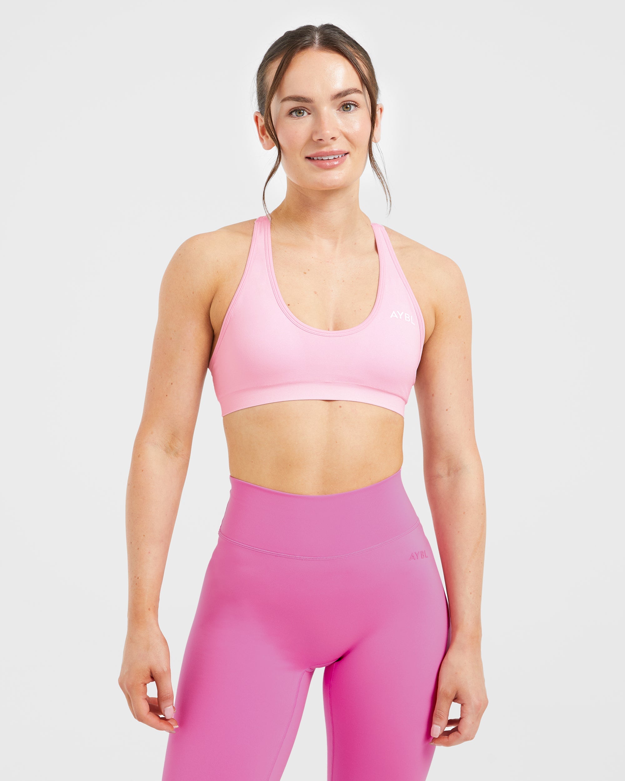 Essential Seamless Racer Back Sports Bra - Baby Rosa