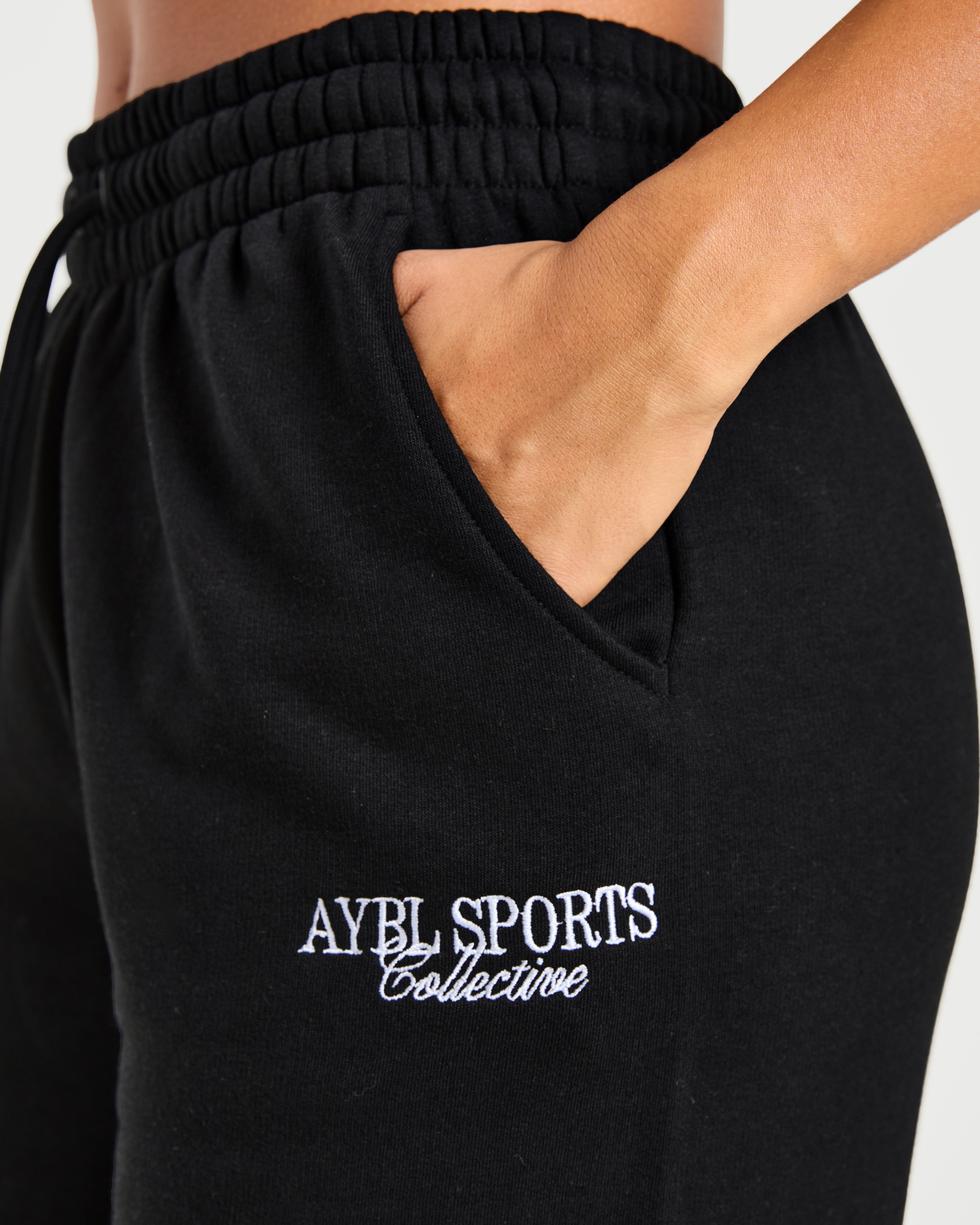 Sports Collective Oversized Straight Leg Joggers - Schwarz