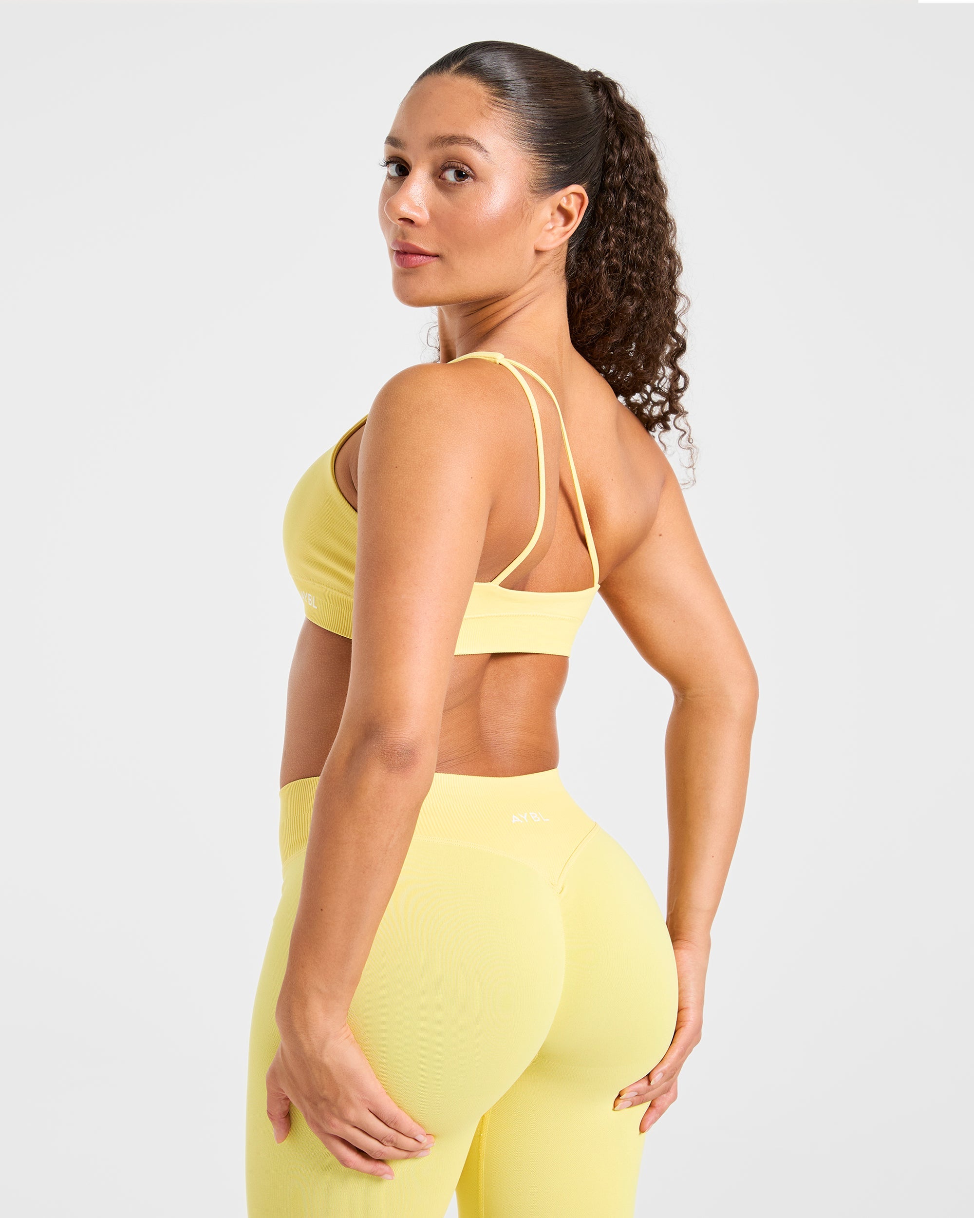 Enhance Seamless One Shoulder Sports Bra - Bright Gelb