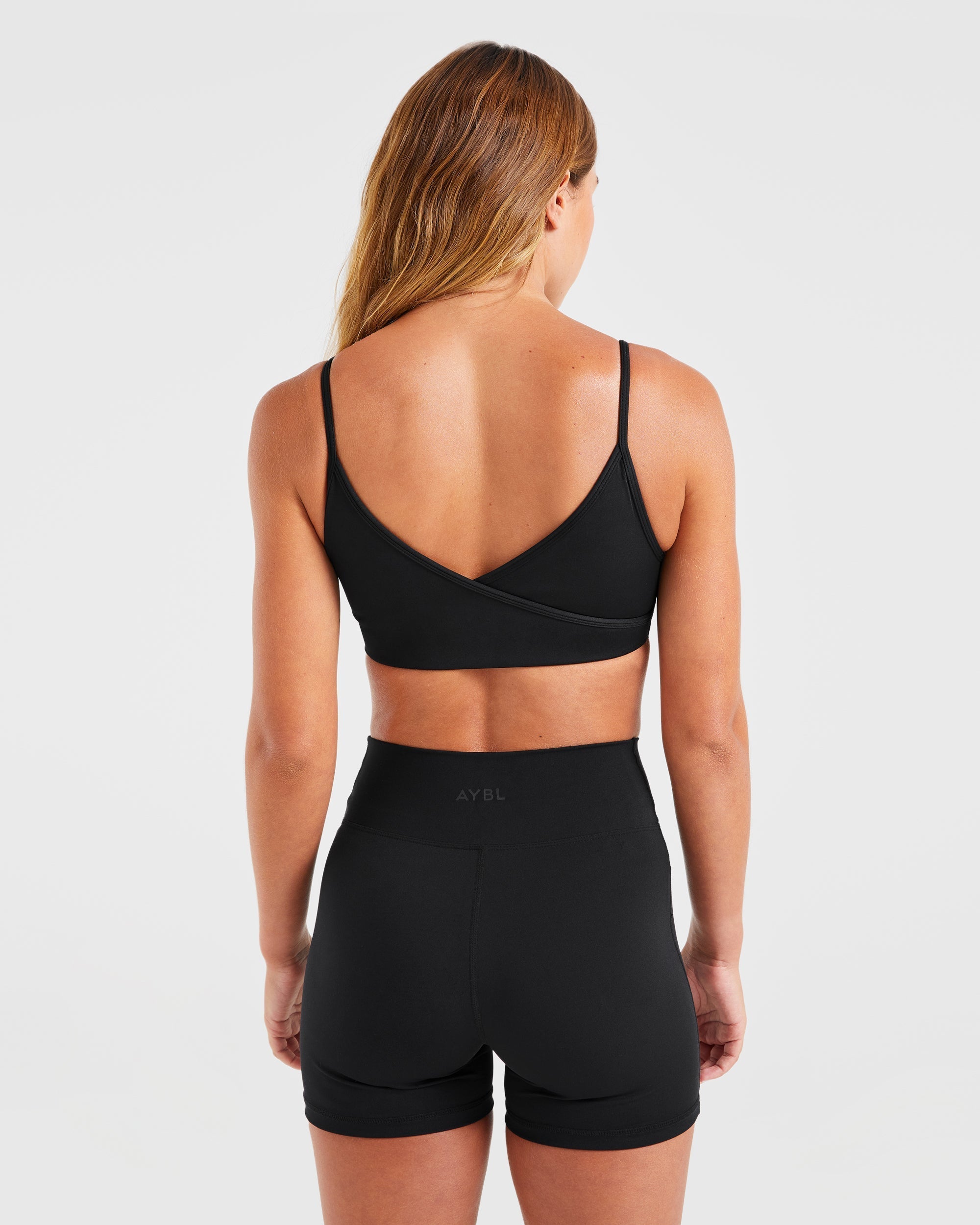 Sculpt Wrap Sports Bra - Schwarz