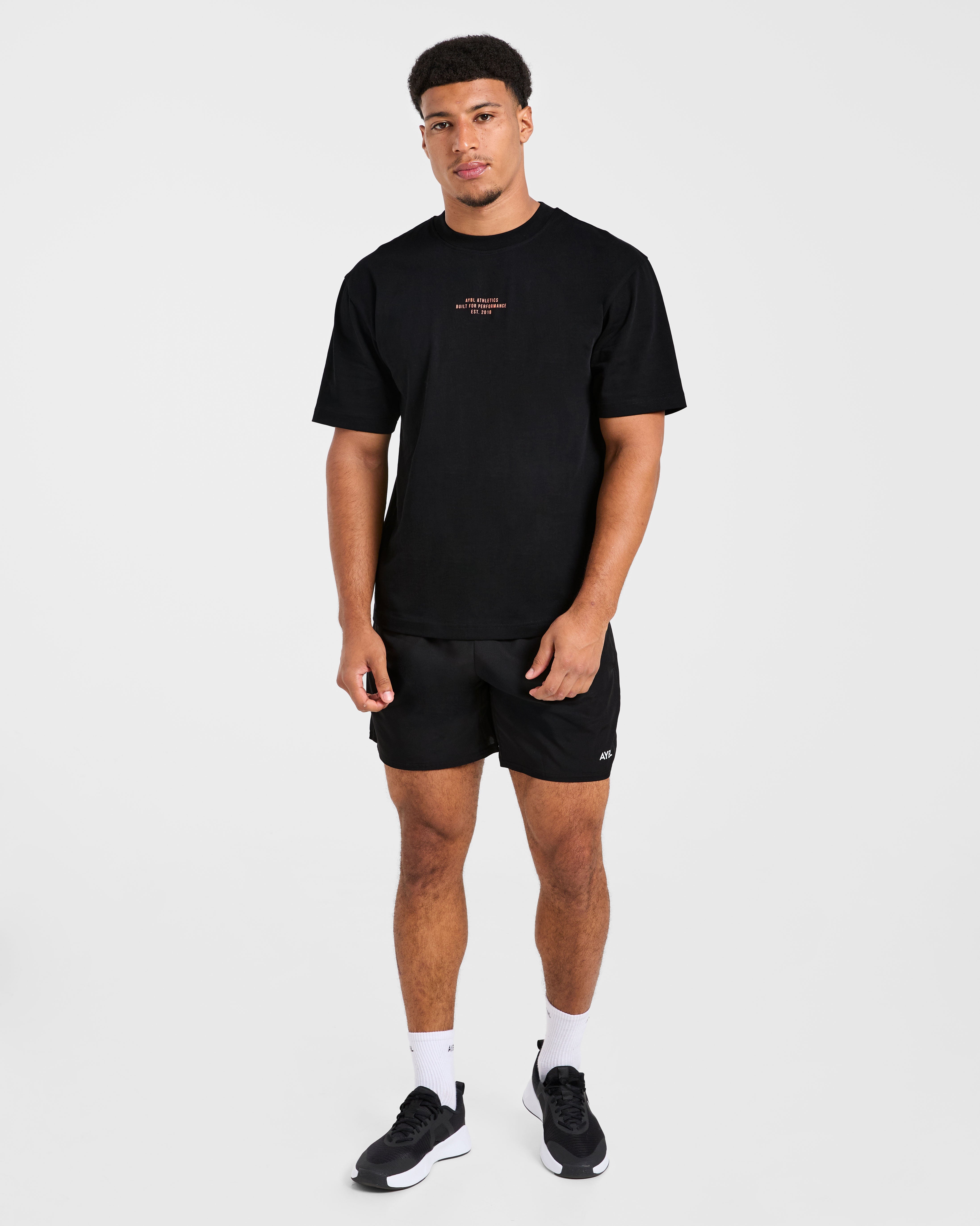 Athletics Performance T Shirt - Schwarz/Orange