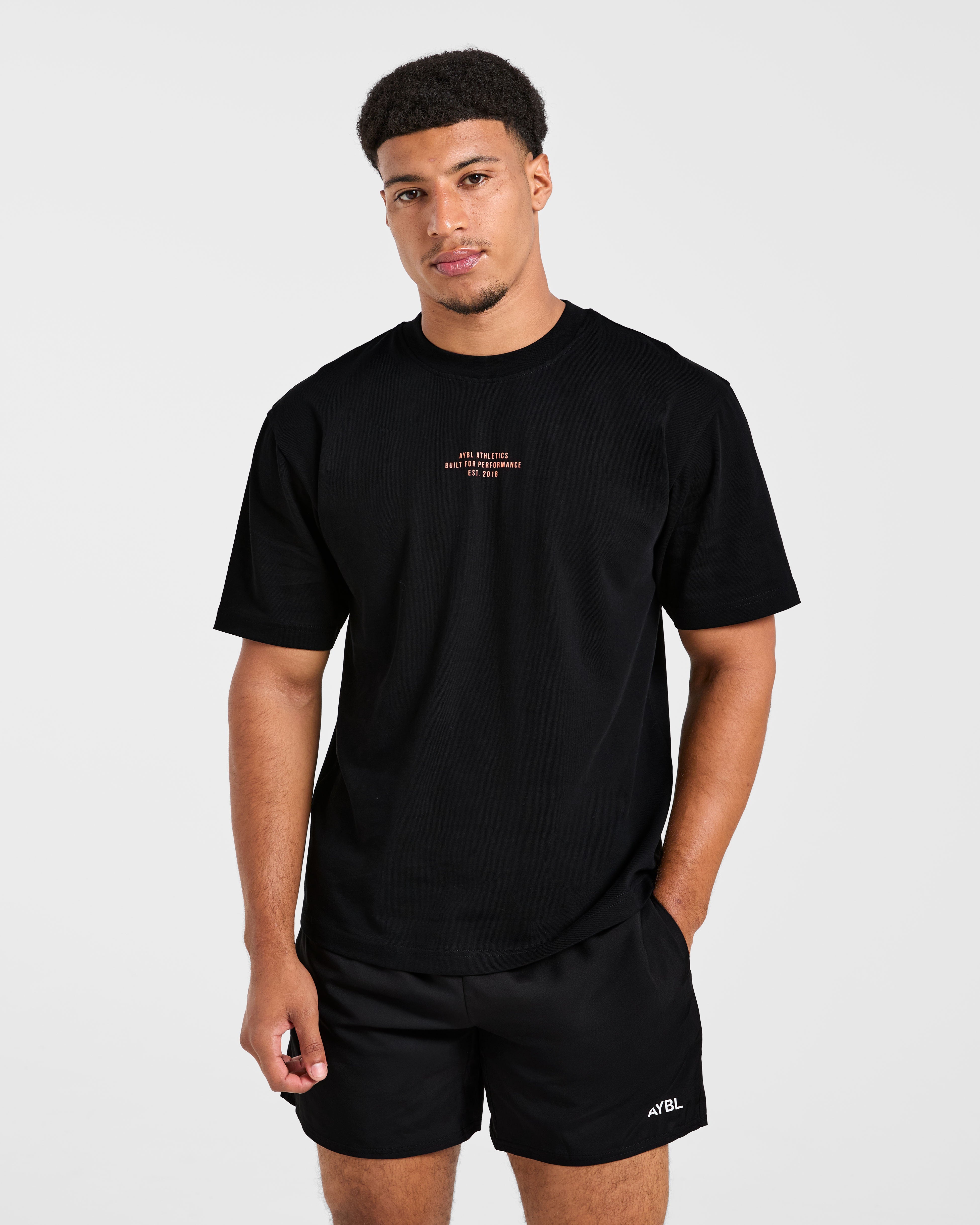 Athletics Performance T Shirt - Schwarz/Orange