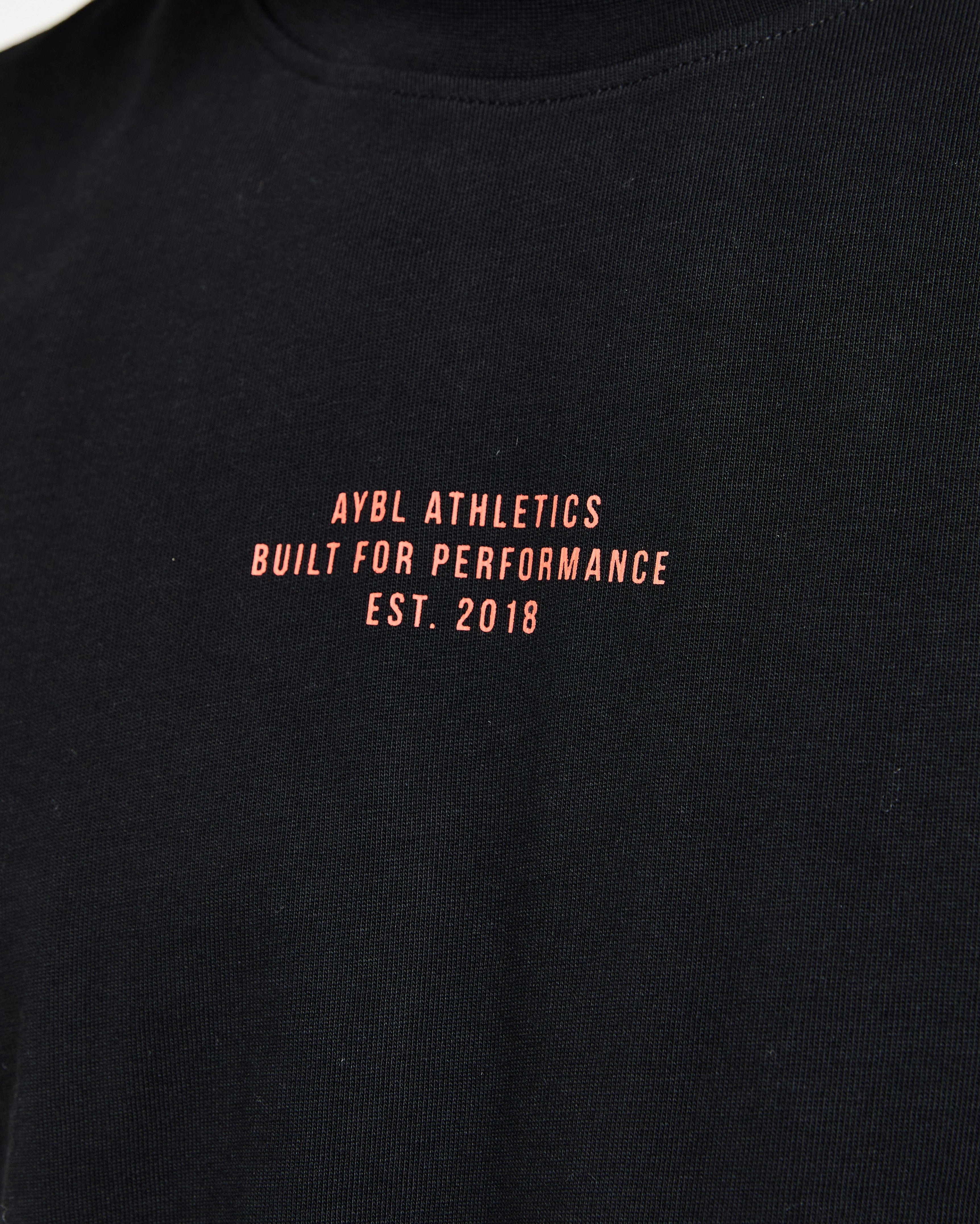 Athletics Performance T Shirt - Schwarz/Orange