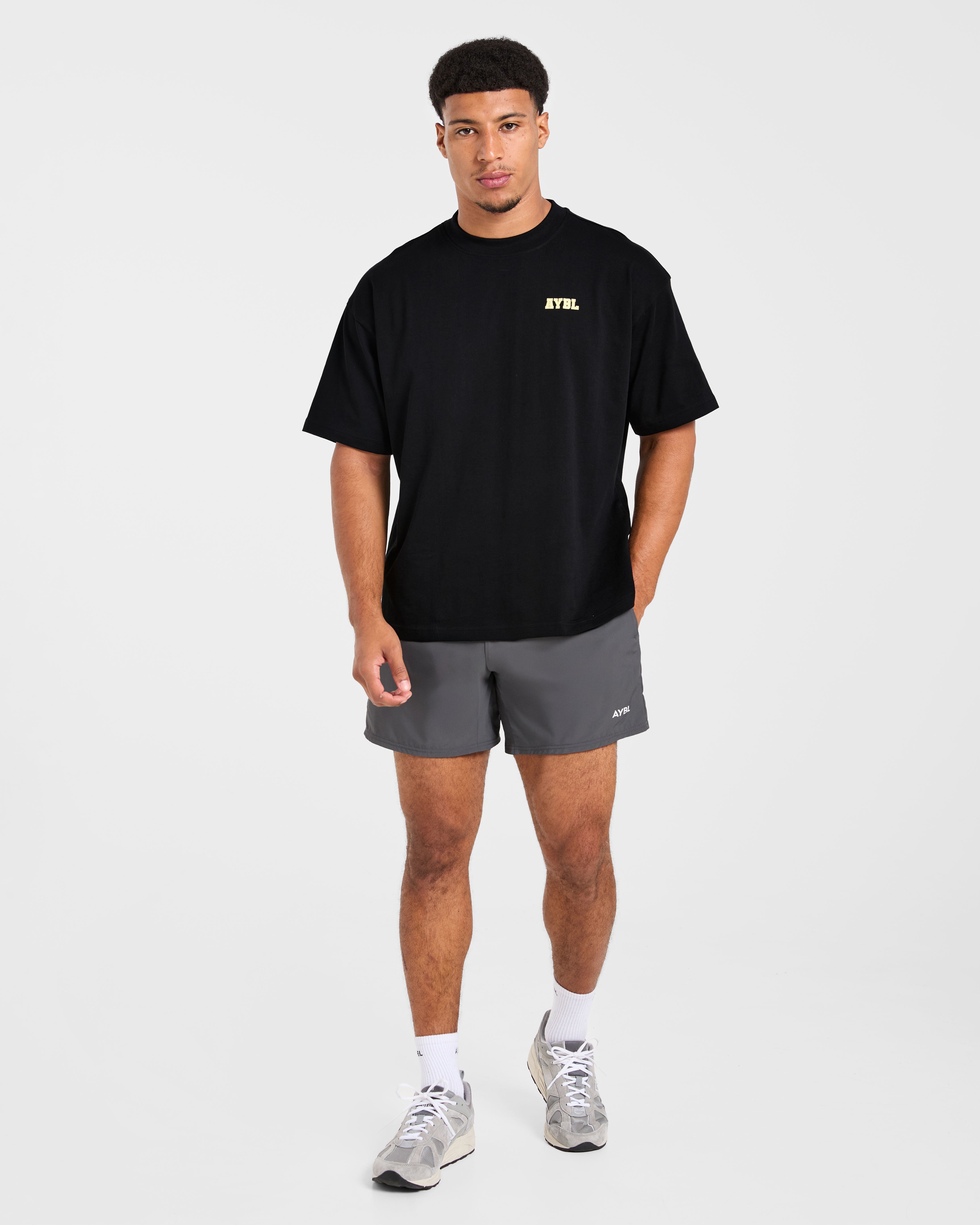 Power In Motion Oversized T Shirt - Schwarz/Gelb