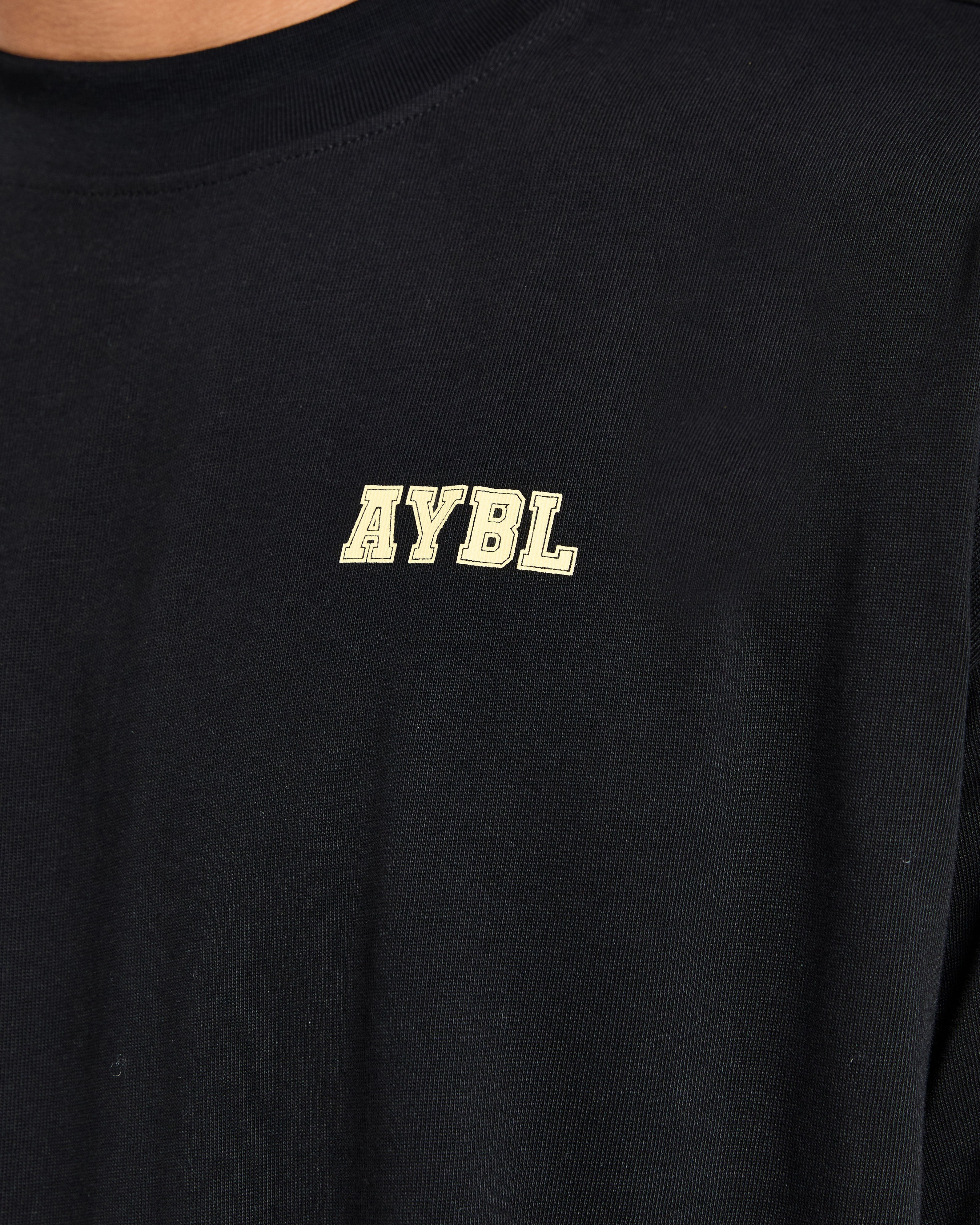 Power In Motion Oversized T Shirt - Schwarz/Gelb