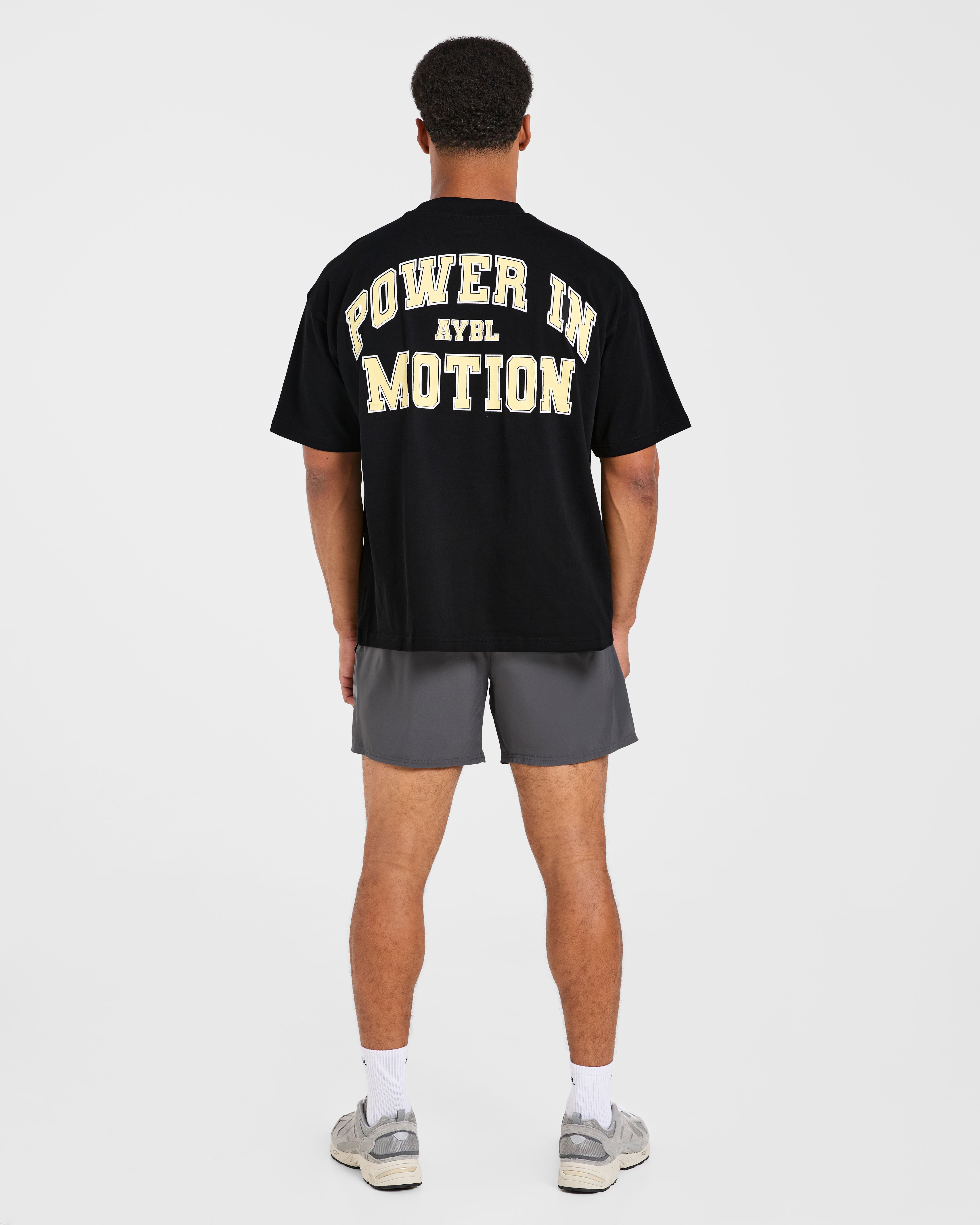 Power In Motion Oversized T Shirt - Schwarz/Gelb