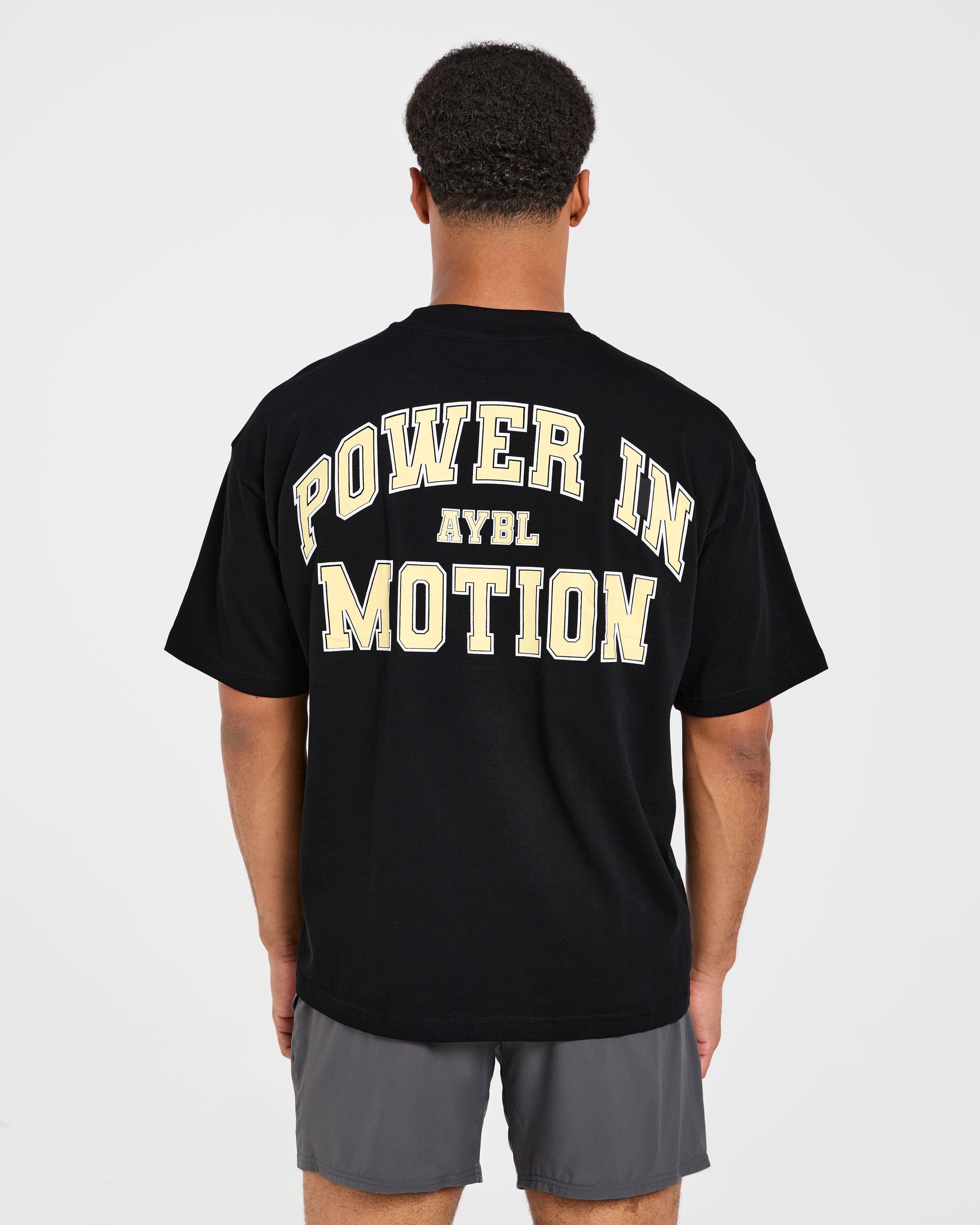 Power In Motion Oversized T Shirt - Schwarz/Gelb