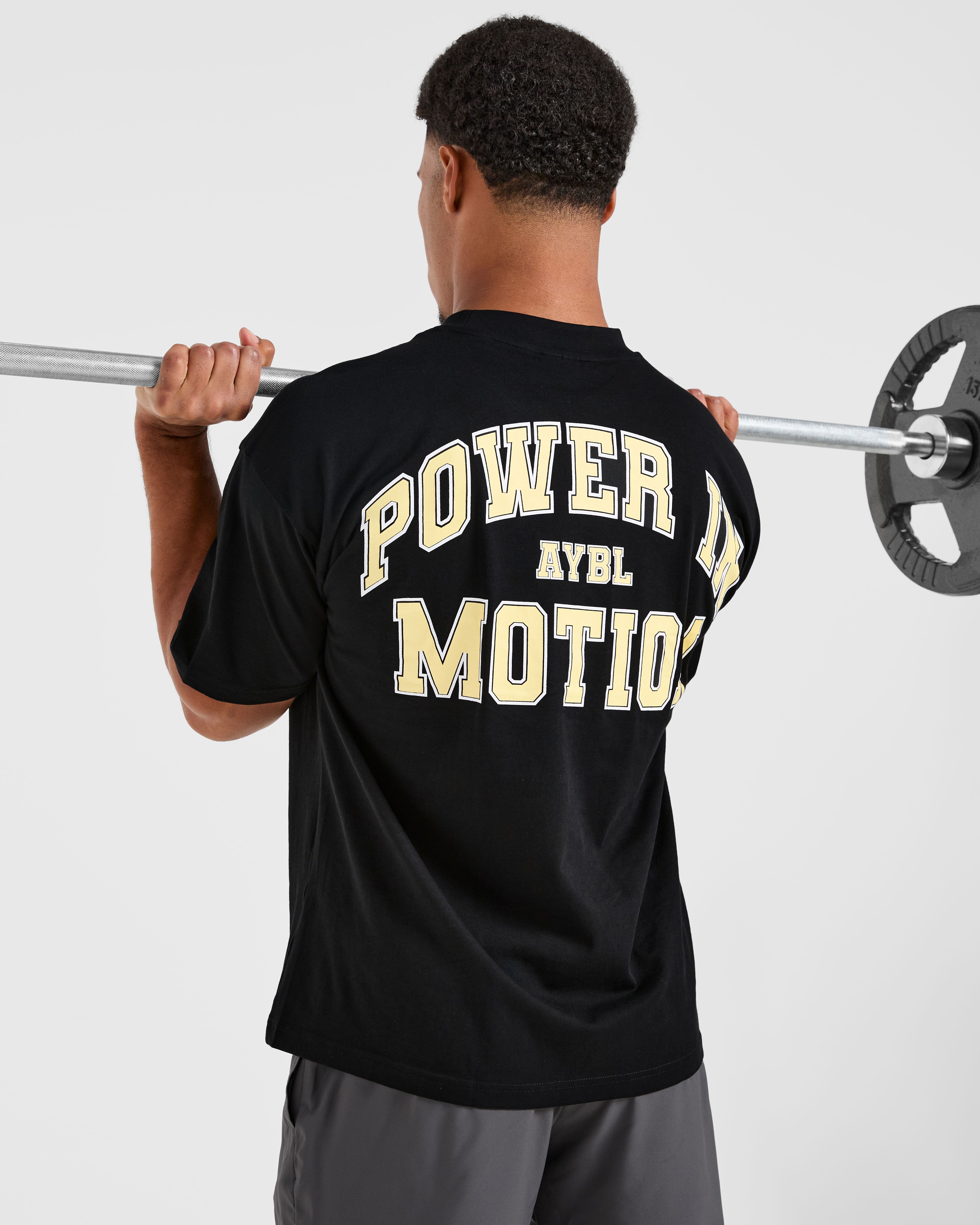 Power In Motion Oversized T Shirt - Schwarz/Gelb
