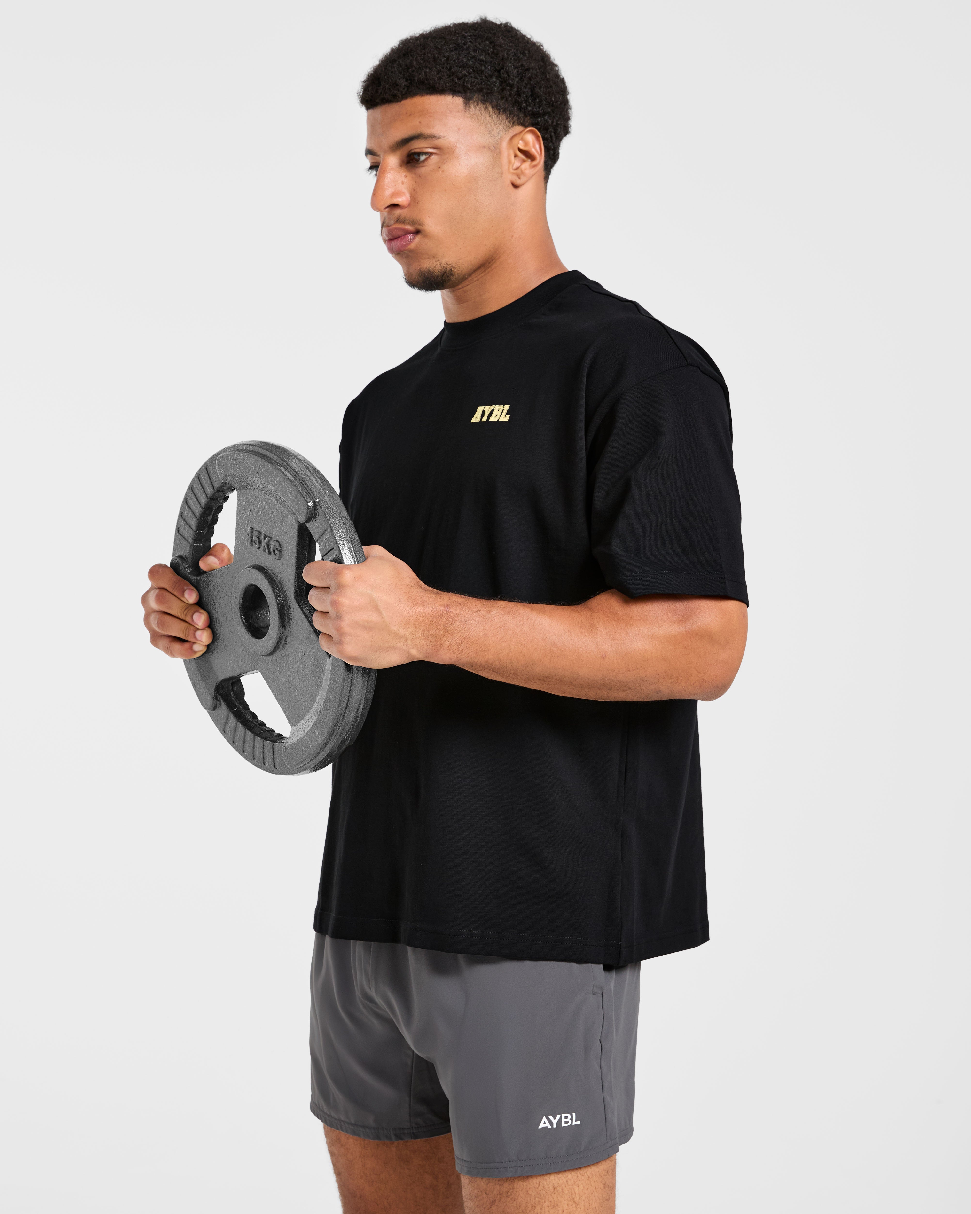 Power In Motion Oversized T Shirt - Schwarz/Gelb