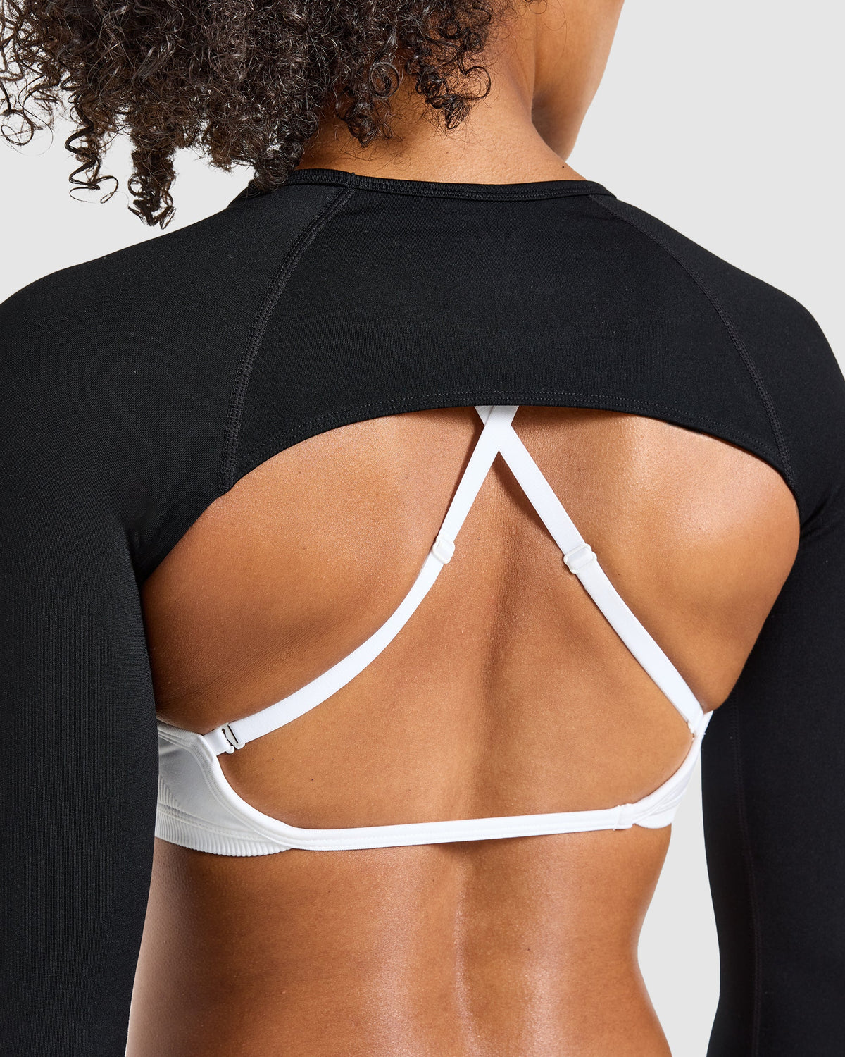 Adapt Seamless Shrug - Schwarz