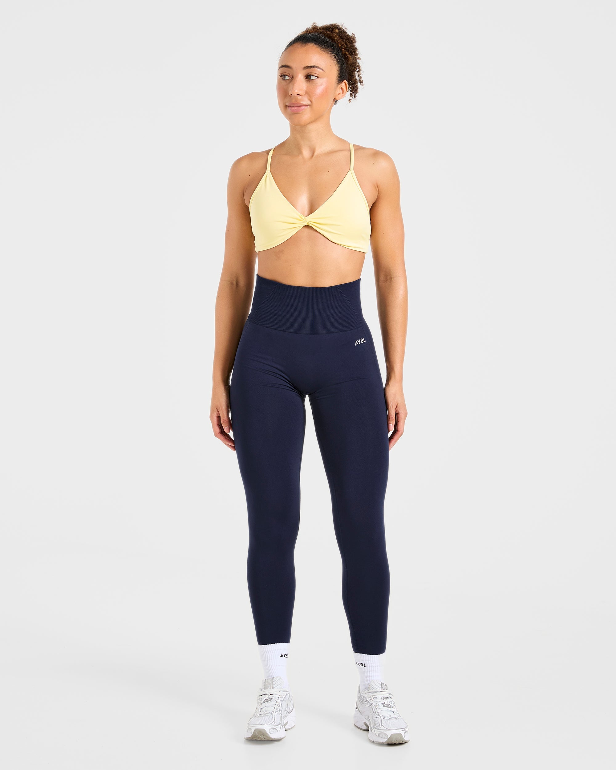 Essential Twist Crossback Sports Bra - Gelb