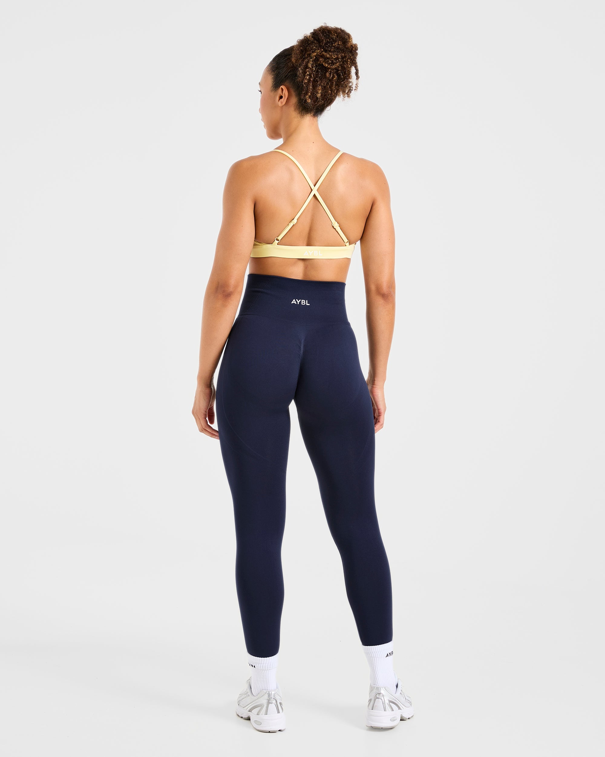 Essential Twist Crossback Sports Bra - Gelb