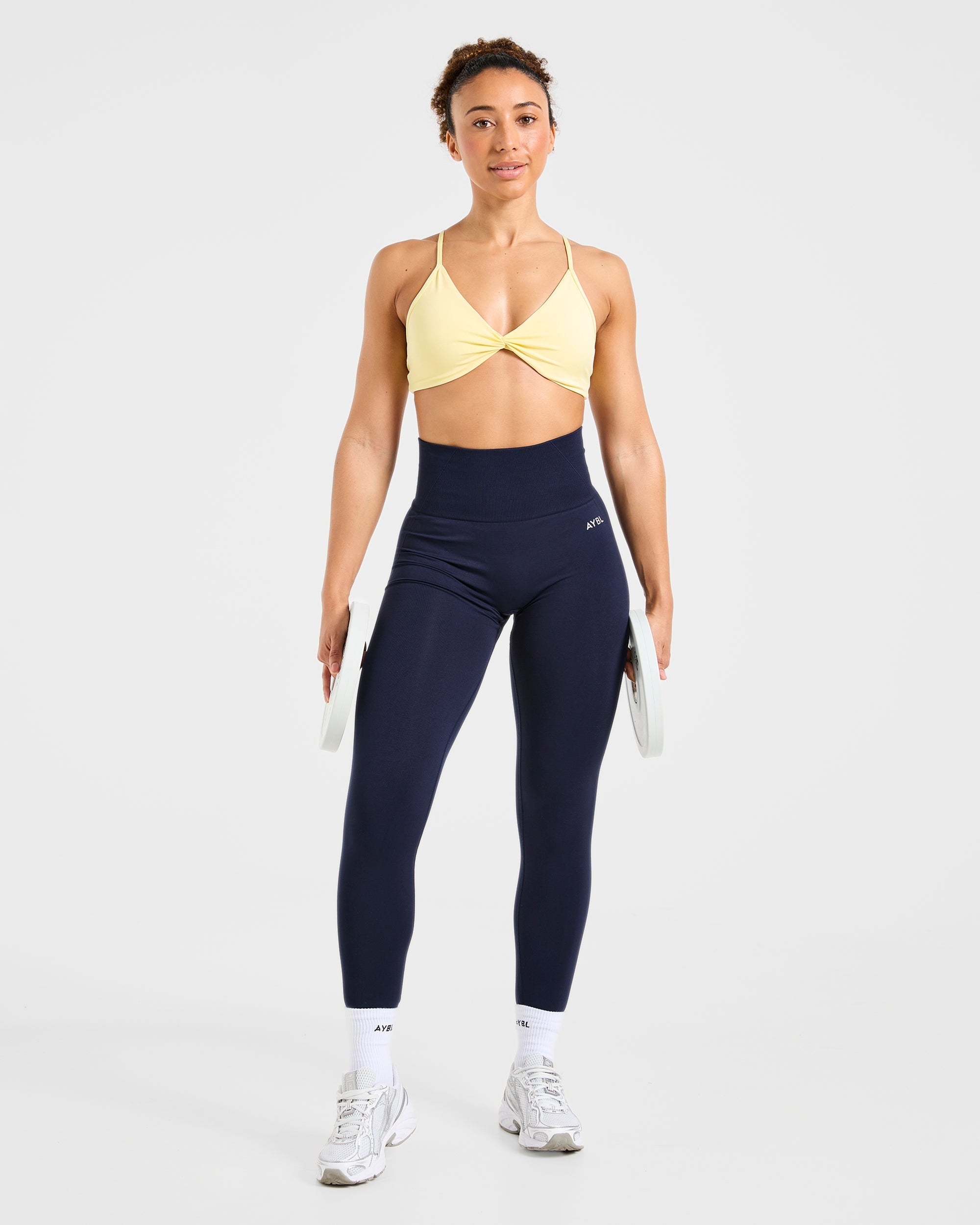 Essential Twist Crossback Sports Bra - Gelb