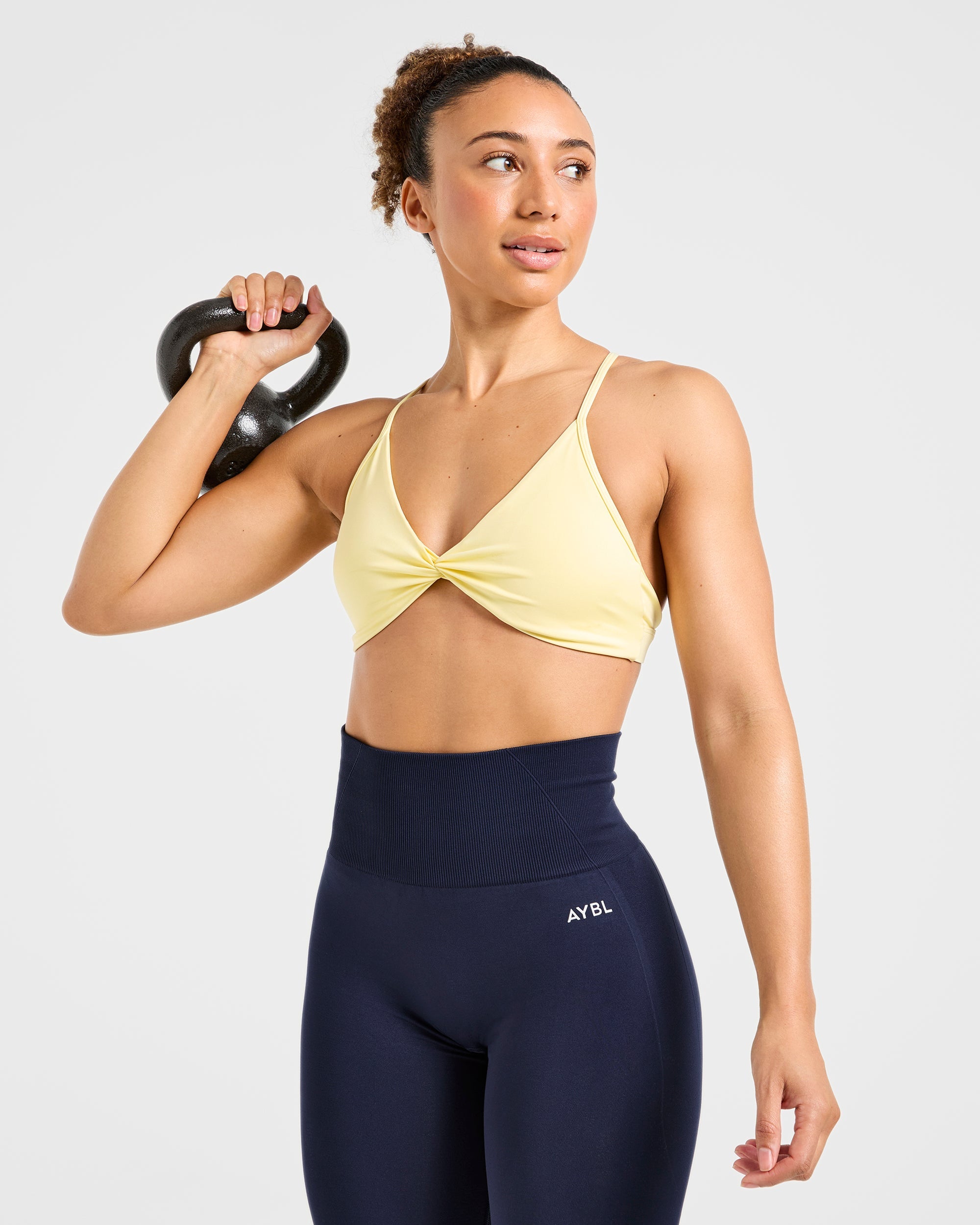 Essential Twist Crossback Sports Bra - Gelb