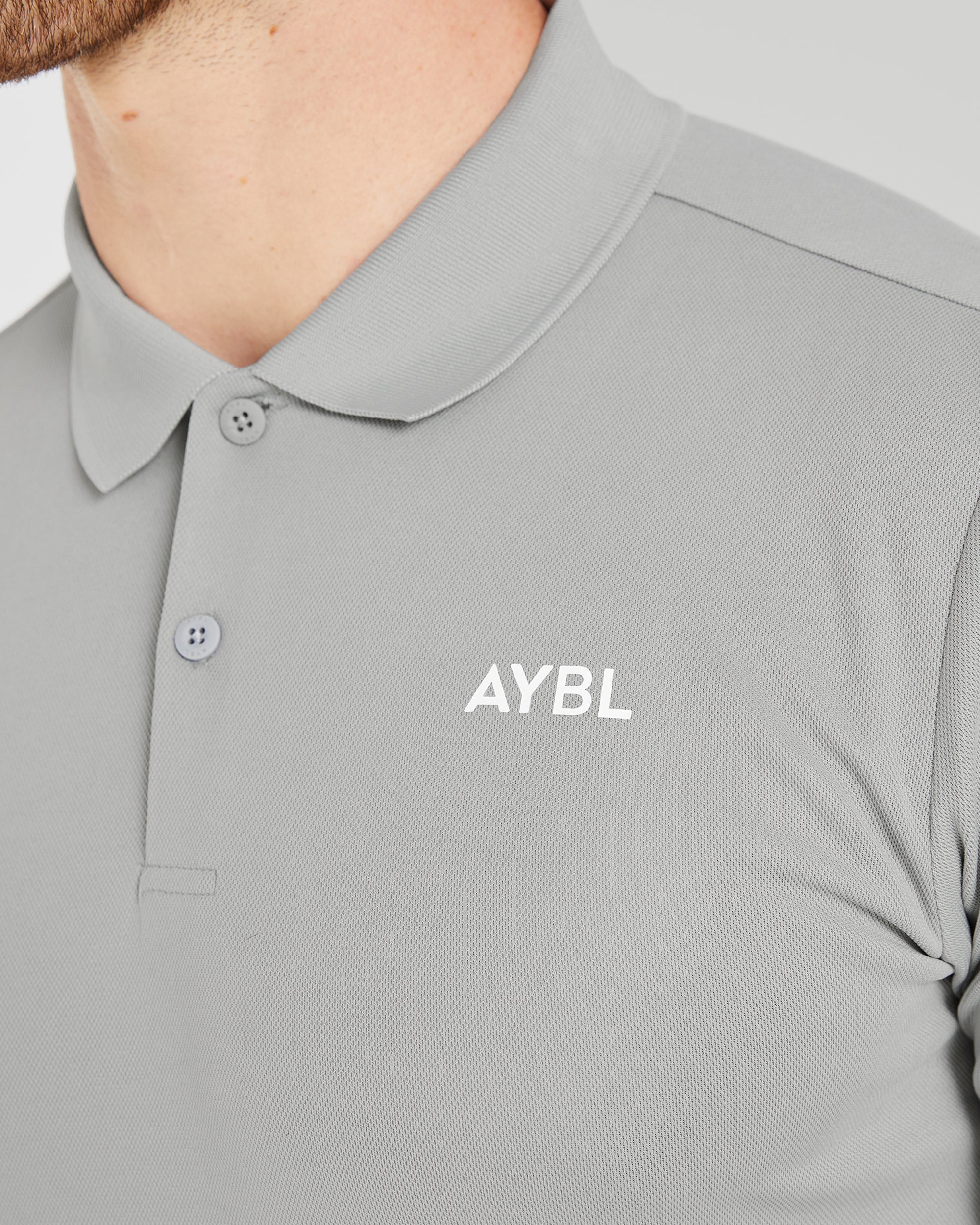 Performance Polo Shirt - Light Grau