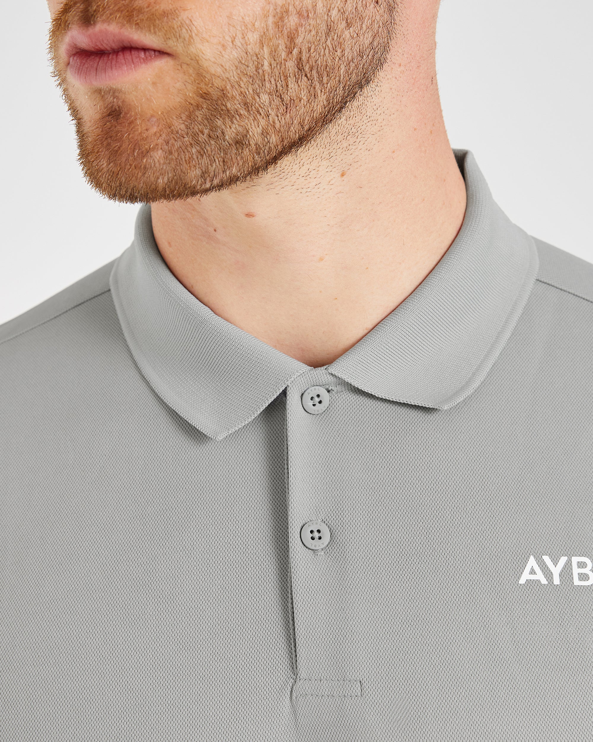 Performance Polo Shirt - Light Grau