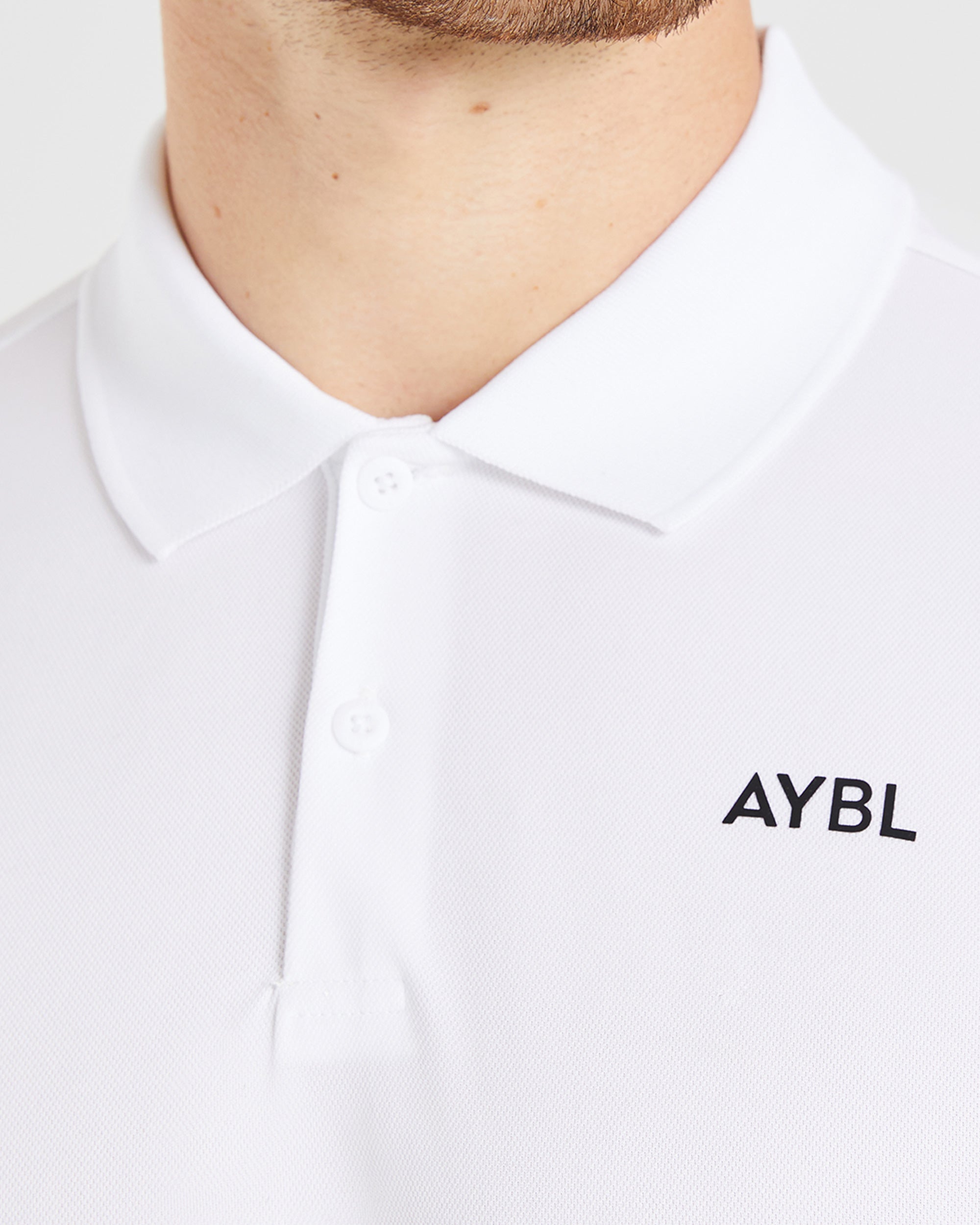 Performance Polo Shirt - Weiß