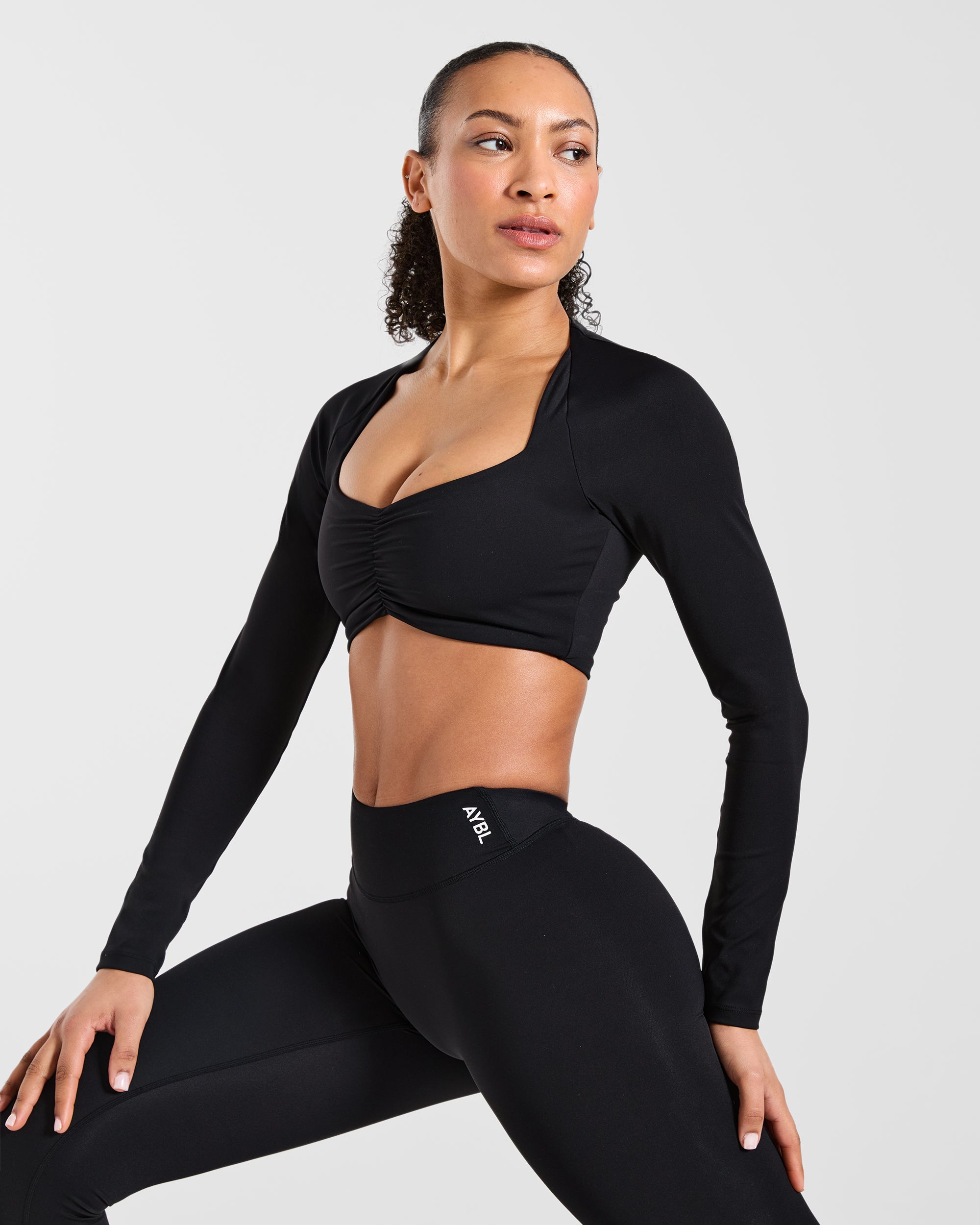 Physique Long Sleeve Crop Top - Schwarz
